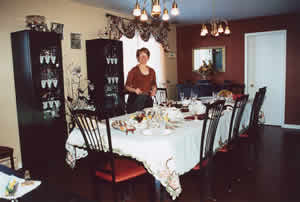 Breakfast table and host